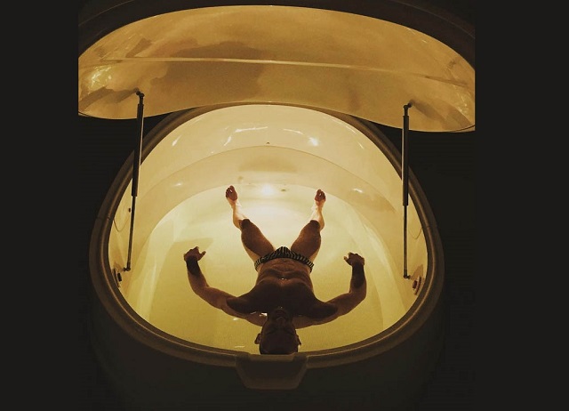 man inside float tank